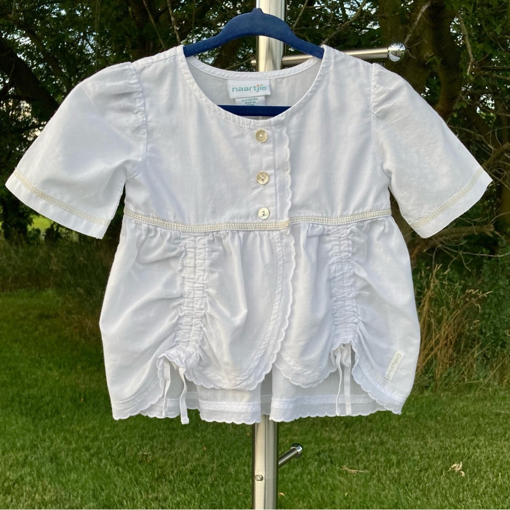 naartjie: 6-12 months girls white top with all the details to make it stand out.